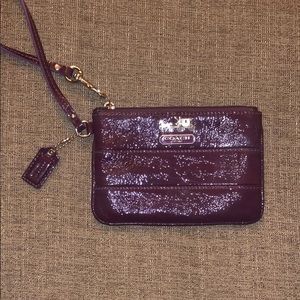 Coach small wristlet- glossy purple